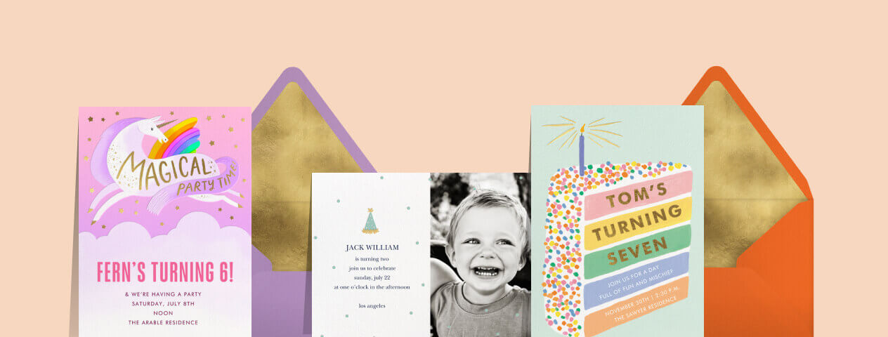 On a pink background: a pink card with a unicorn; a purple envelope; a card with a black and white photo of a toddler; a card with a rainbow birthday cake slice; an orange envelope.